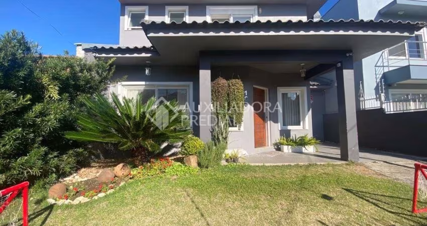 Casa com 3 quartos à venda na Rua Ivo Lessa Silveira, 160, Parque 35, Guaíba