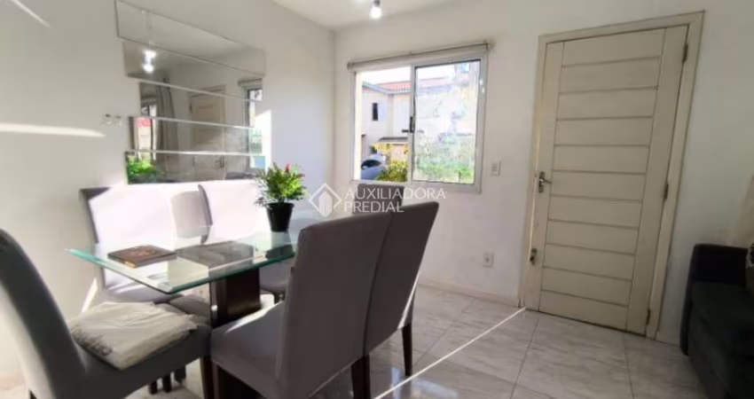 Casa em condomínio fechado com 3 quartos à venda na Rua dos Guaramirins, 303, Igara, Canoas