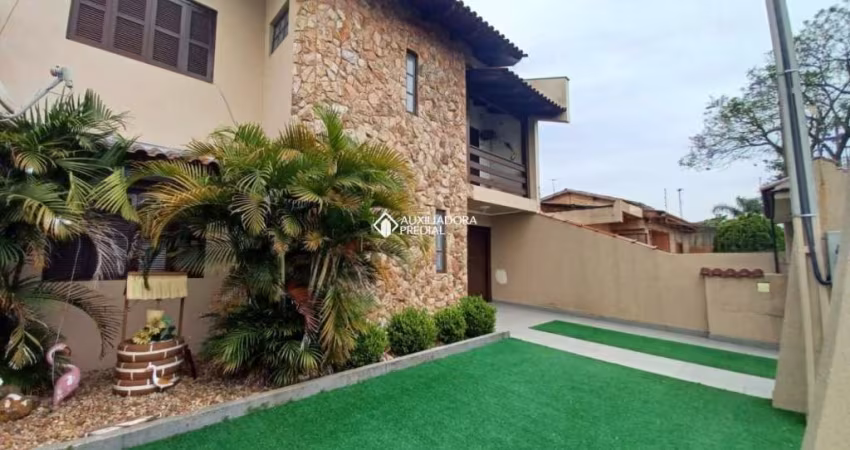 Casa com 3 quartos à venda na Rua Imbe, 208, Estância Velha, Canoas