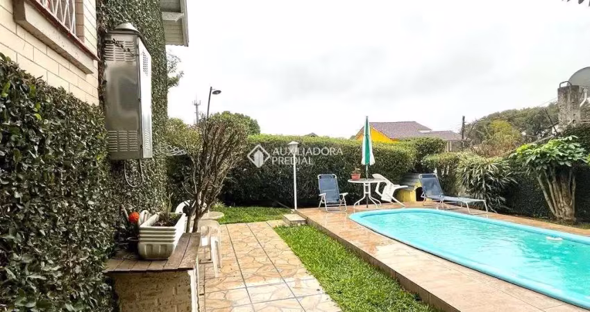 Casa com 3 quartos à venda na Avenida Felipe Weimann, 125, Santa Tereza, Porto Alegre