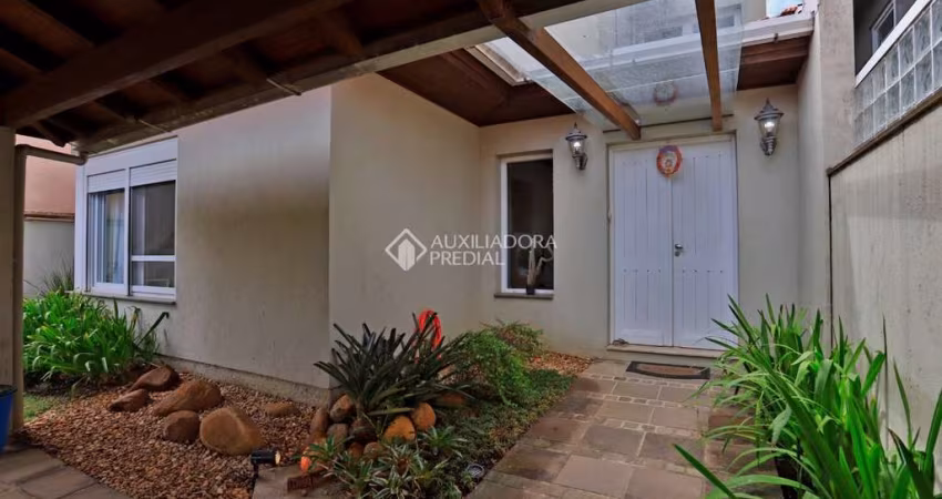 Casa em condomínio fechado com 3 quartos à venda na Avenida Juca Batista, 8000, Belém Novo, Porto Alegre