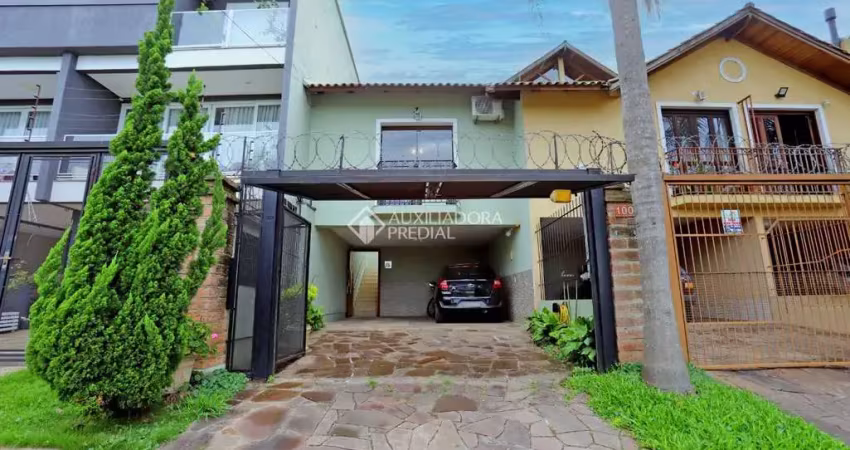 Casa com 3 quartos à venda na Rua do Pampa, 100, Costa e Silva, Porto Alegre
