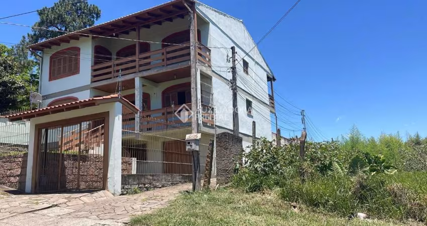 Casa com 1 quarto à venda na Rua Taveira Júnior, 471, Nonoai, Porto Alegre