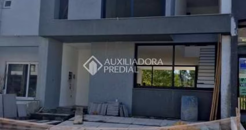 Casa em condomínio fechado com 3 quartos à venda na Rua Eroni Soares Machado, 300, Hípica, Porto Alegre
