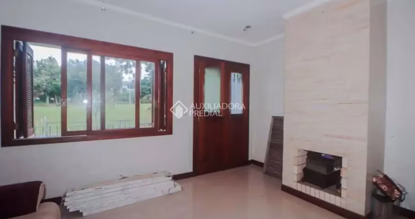 Casa com 4 quartos à venda na Rua Argélia, 101, Vila Ipiranga, Porto Alegre