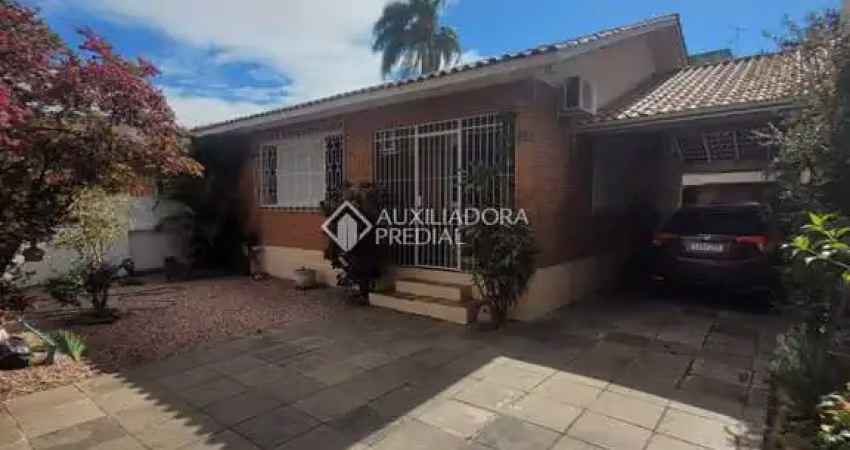 Casa com 5 quartos à venda na Rua Padre Todesco, 454, Partenon, Porto Alegre