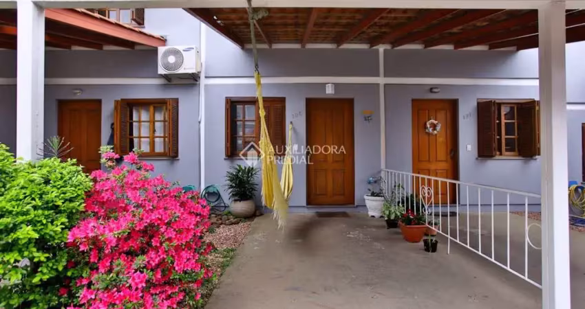 Casa em condomínio fechado com 2 quartos à venda na Avenida Otto Niemeyer, 2417, Tristeza, Porto Alegre