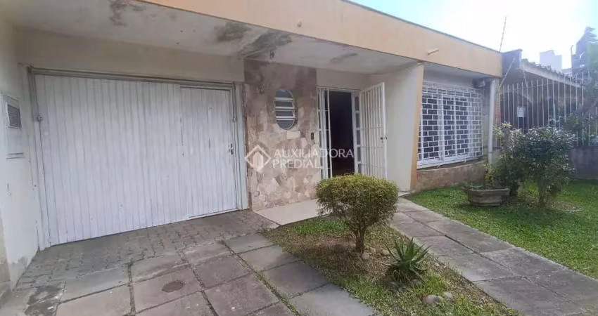 Casa em condomínio fechado com 3 quartos à venda na Rua Professor Guerreiro Lima, 539, Partenon, Porto Alegre