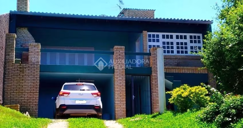 Casa em condomínio fechado com 4 quartos à venda na Rua dos Guananas, 290, Espírito Santo, Porto Alegre