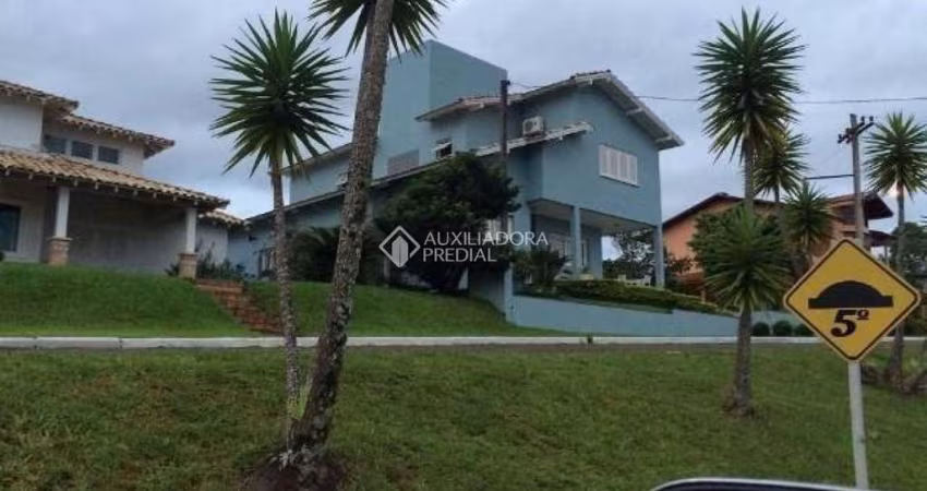 Casa em condomínio fechado com 5 quartos à venda na Estrada Capitão Gentil Machado de Godoy, 4500, Vila Elsa, Viamão
