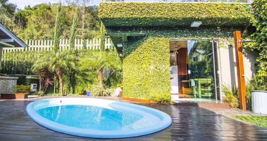 Casa em condomínio fechado com 3 quartos à venda na Estrada Capitão Gentil Machado de Godoy, 4500, Vila Elsa, Viamão