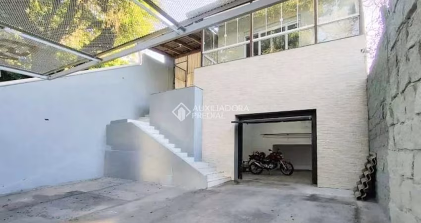 Casa em condomínio fechado com 4 quartos à venda na Avenida Pinheiro Borda, 457, Cristal, Porto Alegre