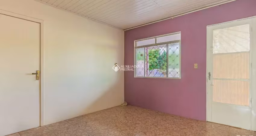 Casa com 3 quartos à venda na SESSENTA E CINCO, 23, Guajuviras, Canoas