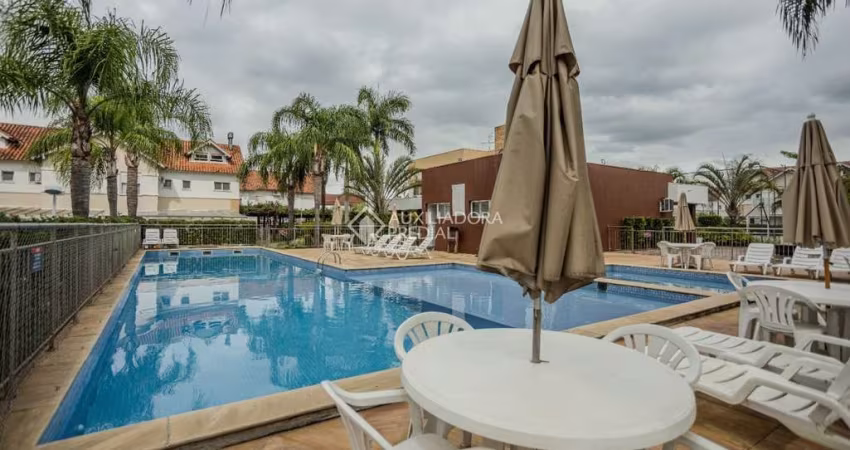 Casa em condomínio fechado com 3 quartos à venda na Avenida Açucena, 650, Estância Velha, Canoas