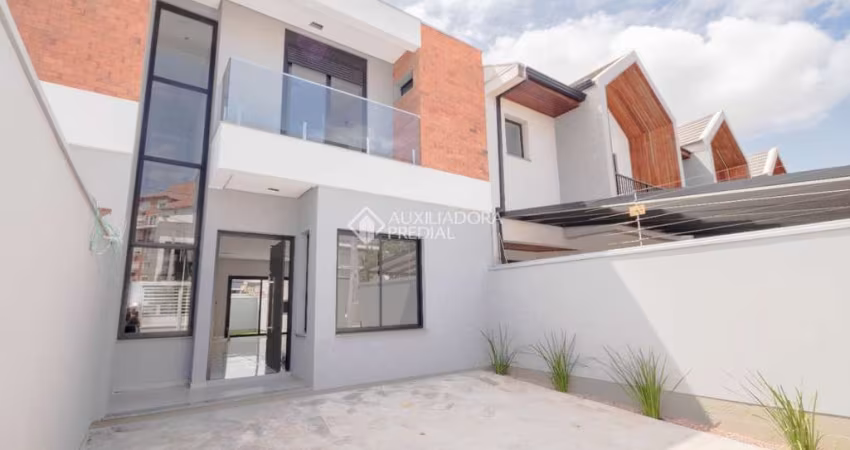 Casa com 3 quartos à venda na Rua Professora Delphina Ferrari, 228, Igara, Canoas