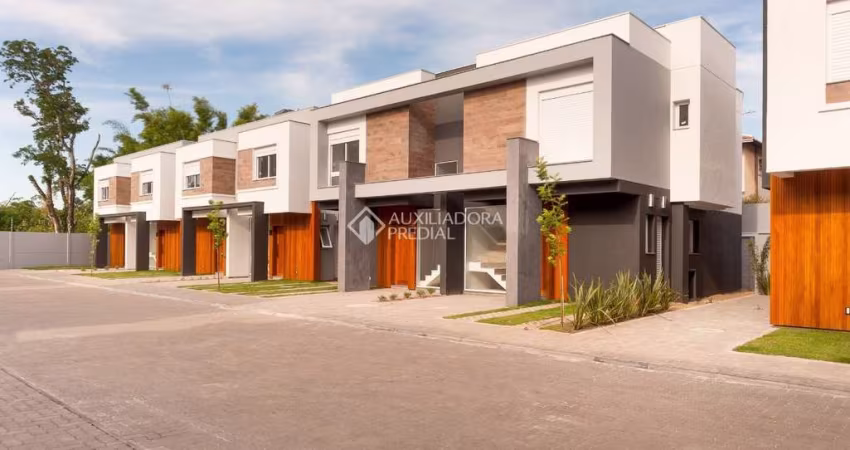 Casa em condomínio fechado com 3 quartos à venda na Avenida John Kennedy, 230, Morro do Espelho, São Leopoldo