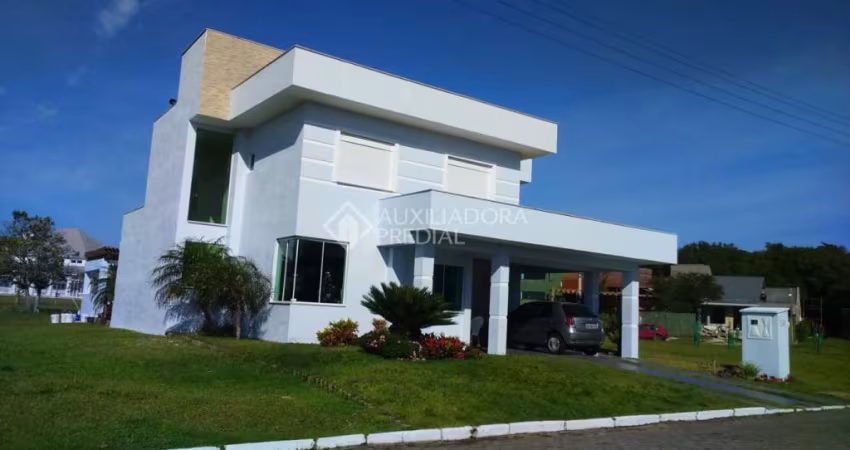 Casa em condomínio fechado com 4 quartos à venda na Rua Grama Azul, 7400, Centro, Tramandaí