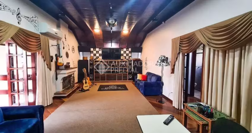 Casa em condomínio fechado com 4 quartos à venda na Rua Alpina, 38, Estância Velha, Canoas