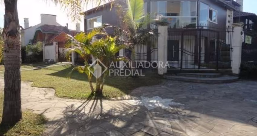 Casa em condomínio fechado com 4 quartos à venda na Rua Gabriel Miro, 230, Marechal Rondon, Canoas