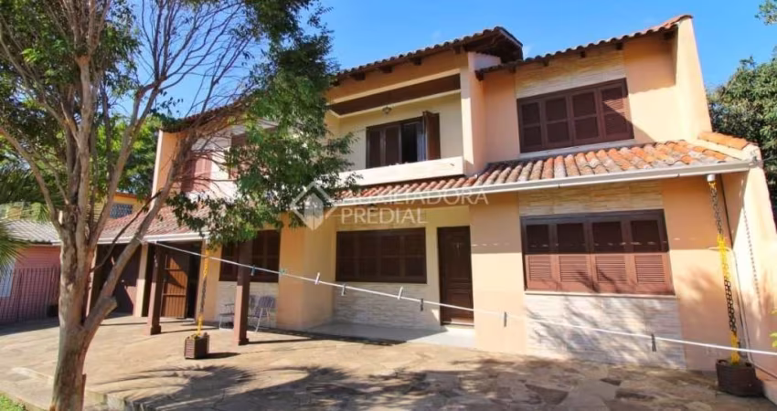 Casa em condomínio fechado com 4 quartos à venda na Rua Ney Brito, 140, Nossa Senhora das Graças, Canoas