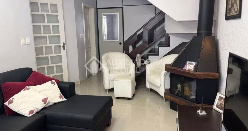 Casa com 4 quartos à venda na Rua das Bromélias, 184, Estância Velha, Canoas