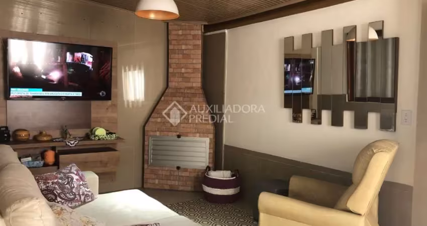 Casa com 2 quartos à venda na Rua Porto Rico, 1061, Sumaré, Alvorada