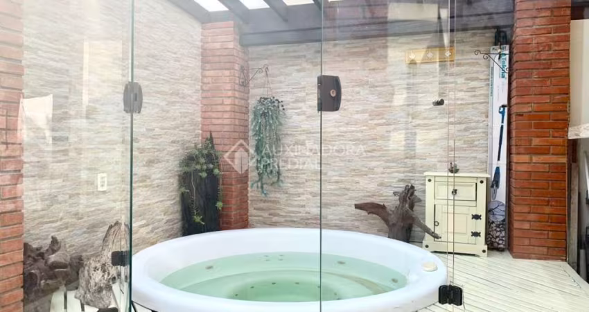 Casa com 3 quartos à venda na Rua País de Gales, 574, Marechal Rondon, Canoas