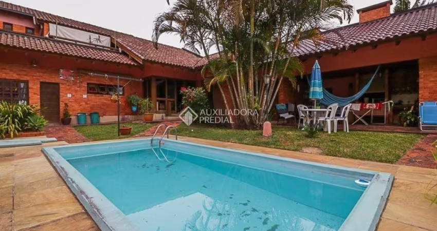 Casa em condomínio fechado com 4 quartos à venda na Rua Professor Ulisses Cabral, 590, Chácara das Pedras, Porto Alegre