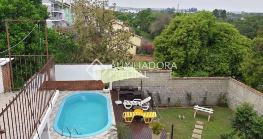 Casa em condomínio fechado com 3 quartos à venda na Avenida Doutor Rubem Knijnik, 533, Costa e Silva, Porto Alegre