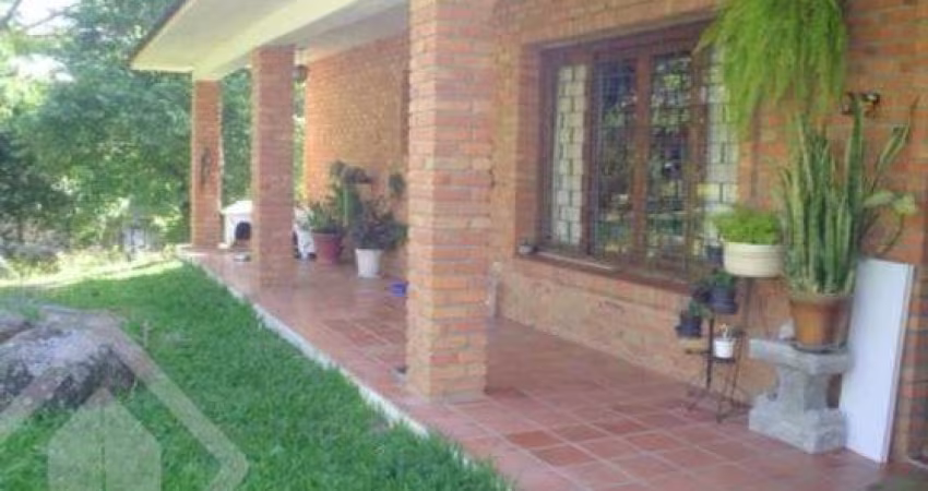 Casa em condomínio fechado com 3 quartos à venda na Estrada Kanazawa, 84, Vila Nova, Porto Alegre