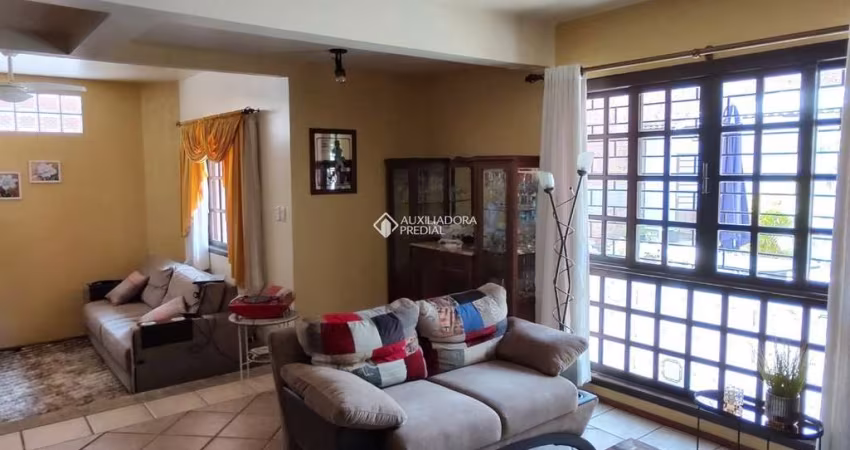Casa com 3 quartos à venda na Rua Itaboraí, 1335, Jardim Botânico, Porto Alegre