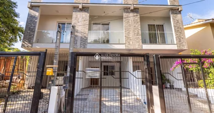 Casa com 3 quartos à venda na Rua Abdo Jorge Curi, 233, Parque Santa Fé, Porto Alegre