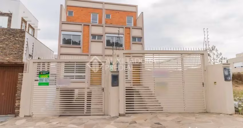 Casa com 3 quartos à venda na Rua Henrique Anawate, 650, Guarujá, Porto Alegre