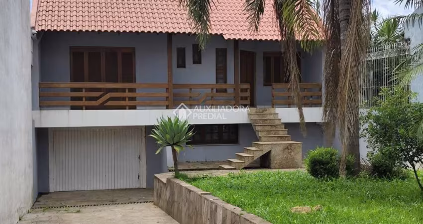 Casa em condomínio fechado com 3 quartos à venda na Avenida Doutor Petrônio Portela, 75, Rubem Berta, Porto Alegre
