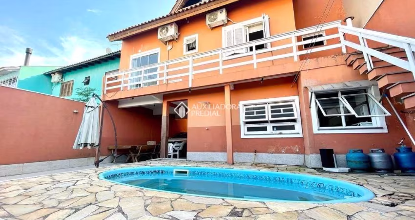 Casa com 4 quartos à venda na Rua Abaeté, 771, Sarandi, Porto Alegre