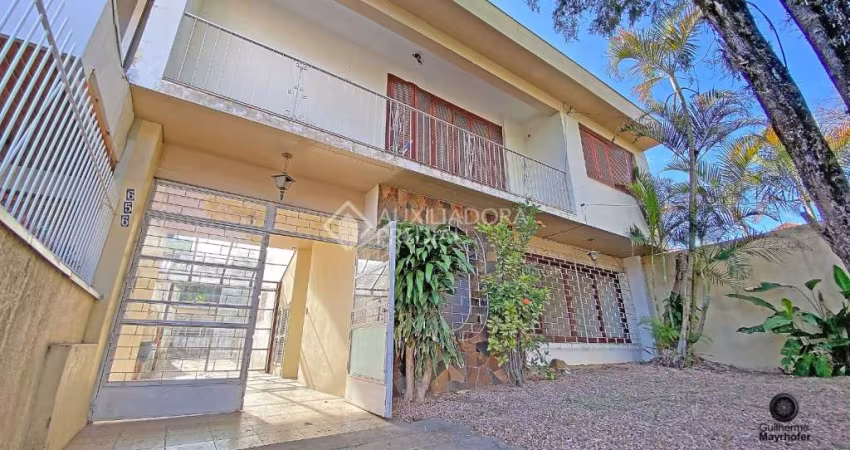 Casa em condomínio fechado com 4 quartos à venda na Avenida José Gertum, 656, Chácara das Pedras, Porto Alegre