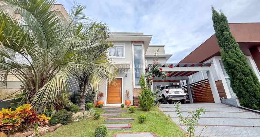 Casa em condomínio fechado com 3 quartos à venda na Avenida Senador Salgado Filho, 8500, São Lucas, Viamão