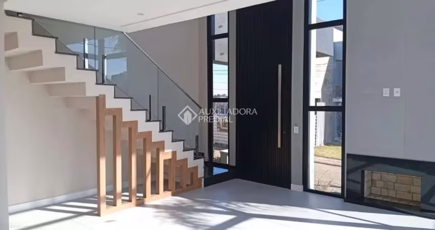 Casa em condomínio fechado com 3 quartos à venda na Rua Tancredo Neves, 990, Jansen, Gravataí