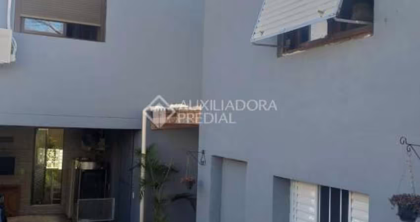 Casa em condomínio fechado com 5 quartos à venda na Rua Monte Alegre, 62, Jardim Floresta, Porto Alegre