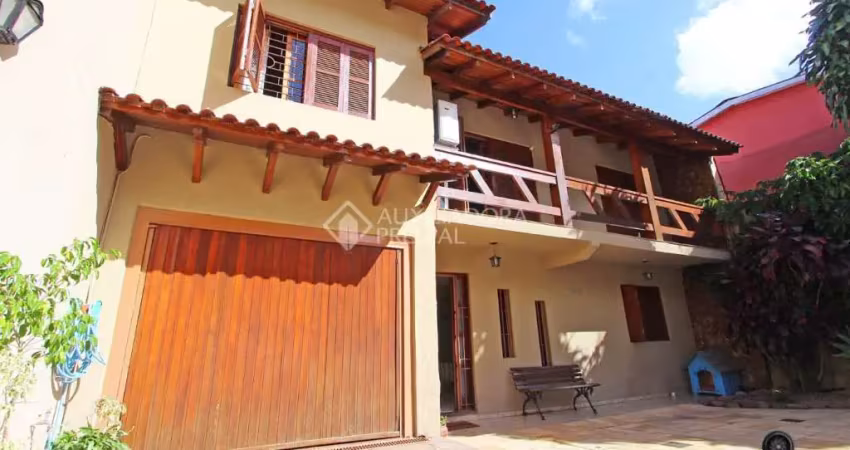Casa em condomínio fechado com 4 quartos à venda na Rua Francisca Lechner, 343, Parque Santa Fé, Porto Alegre