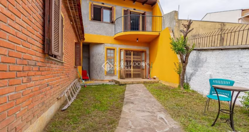 Casa em condomínio fechado com 3 quartos à venda na Rua Artur Azevedo, 54, Partenon, Porto Alegre