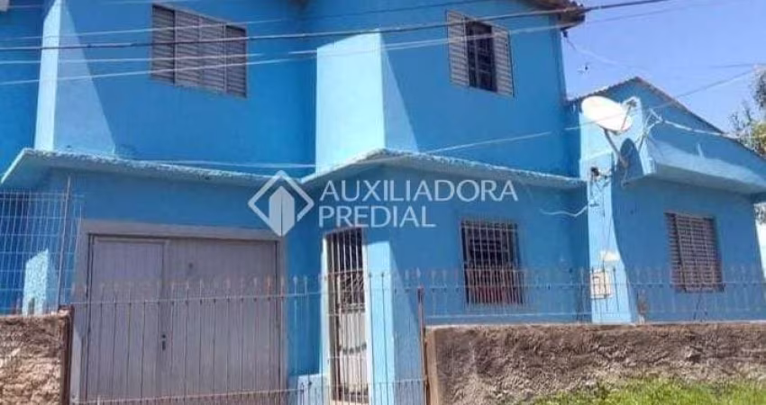 Casa com 4 quartos à venda na Avenida Bernardino Silveira de Amorim, 1980, Santa Rosa de Lima, Porto Alegre