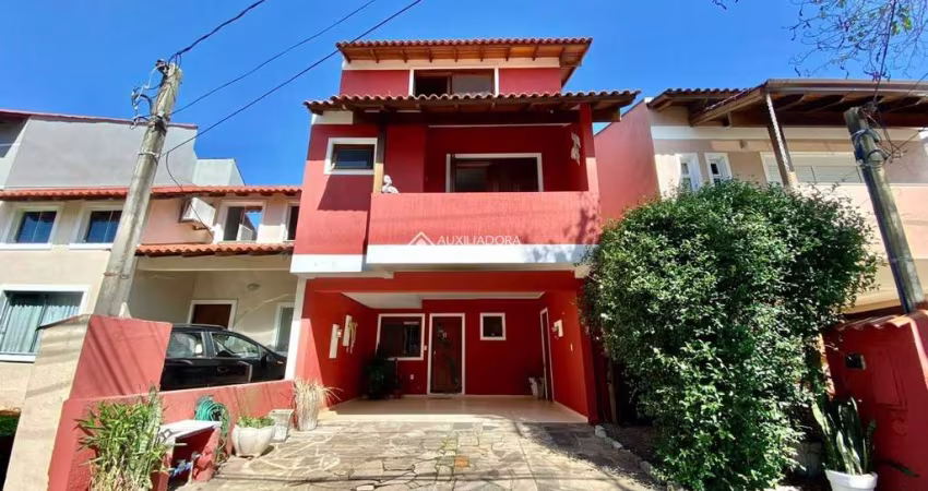 Casa em condomínio fechado com 3 quartos à venda na Rua Guatambu, 627, Hípica, Porto Alegre