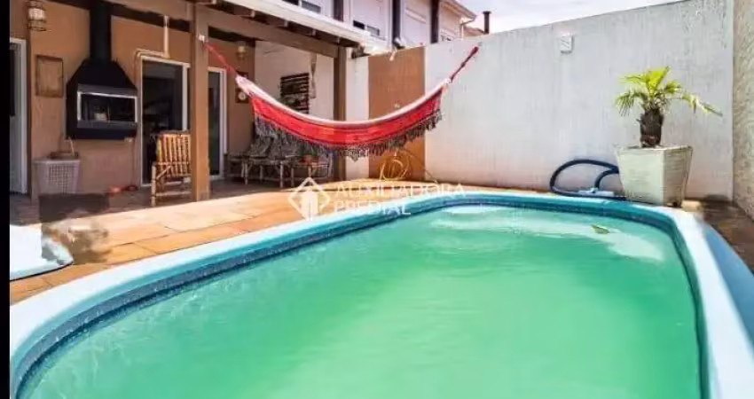 Casa em condomínio fechado com 3 quartos à venda na AVENIDA EDGAR PIRES DE CASTRO - DE 1740 A 2238 - L, 2520, Hípica, Porto Alegre