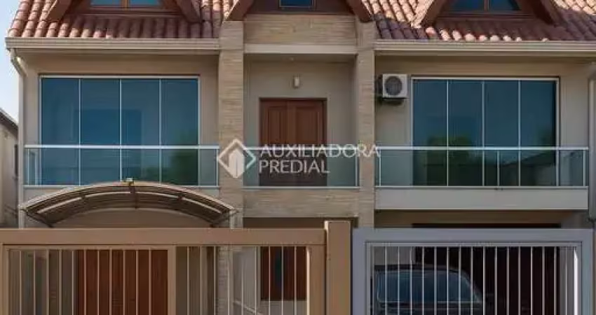 Casa com 2 quartos à venda na Rua Eva Pinto, 39, Hípica, Porto Alegre