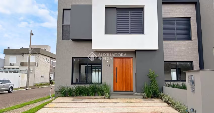 Casa em condomínio fechado com 3 quartos à venda na Rua Jean Vardaramatos, 130, Hípica, Porto Alegre