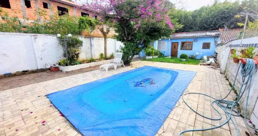 Casa em condomínio fechado com 3 quartos à venda na Rua Sebastião Wolf, 181, Nonoai, Porto Alegre