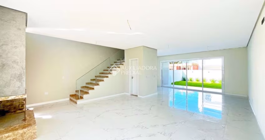Casa com 3 quartos à venda na João Otto Paiva, 35, Hípica, Porto Alegre