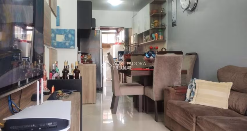 Casa em condomínio fechado com 2 quartos à venda na Rua Embira, 170, Hípica, Porto Alegre