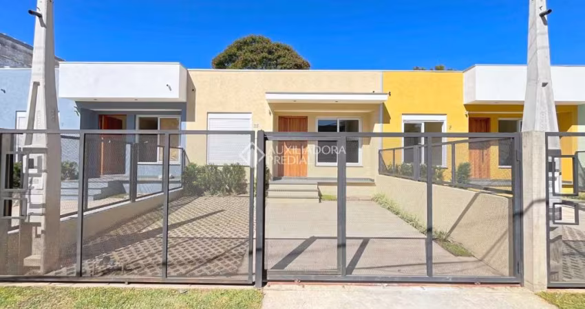 Casa com 3 quartos à venda na Rua Criciúma, 35, Guarujá, Porto Alegre
